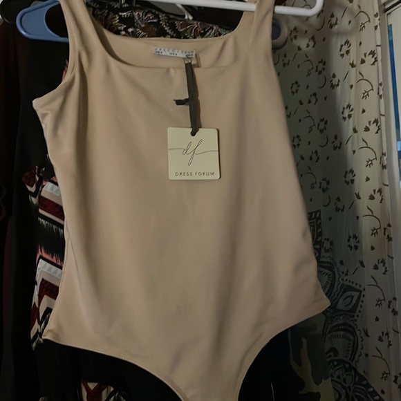Tops - Bnwt body suit size medium by dress forum